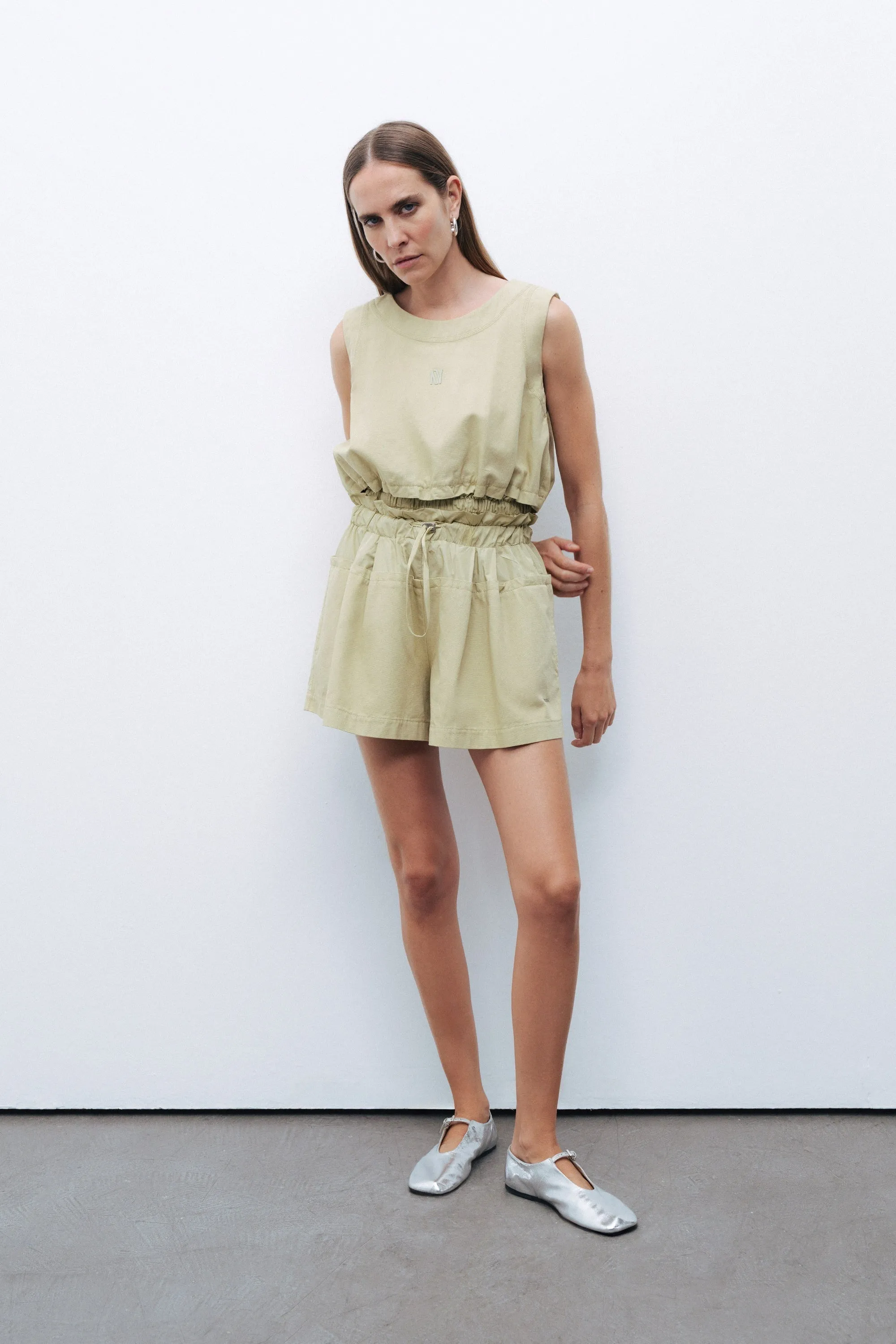 Green Mini Shorts with Printed Details